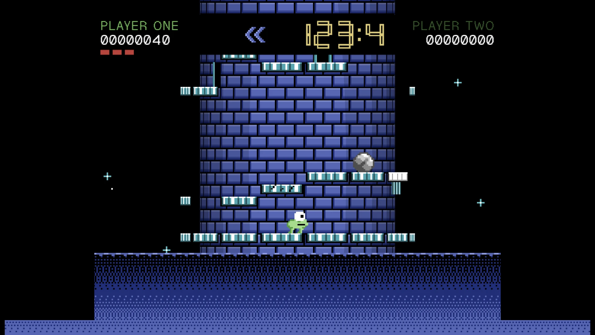 NEBULA TOWERS 64. A brick-filled platformer level with a small green character at the bottom center. PLAYER ONE's score of 00000040 and three health bars appear on the left, while PLAYER TWO's score of 00000000 is on the right, with a timer showing 29:4 in the center. Taken for the update Vite, tempo e mare.